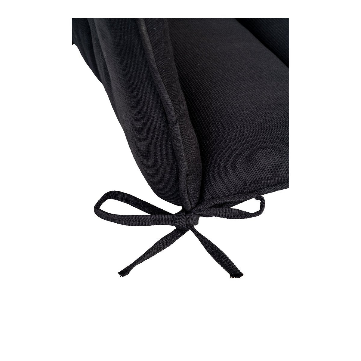 Vue latérale du coussin Cleveland noir sur une chaise blanche