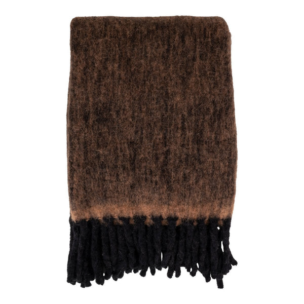 Carmel Plaid marron en laine drapé sur un canapé, style rustique