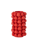 Détail du vase Couvercle Fraises, céramique rouge, ambiance intérieure