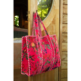 Sac d'oiseaux J-line en velours floral rose, ambiance déco