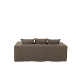 Couverture J-Line en lin taupe dans un salon moderne