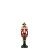 Figurine J-Line Casse-Noisette sur une table décorée pour Noël.