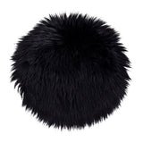 Coussin d'assise en peau d'agneau artificielle noir sur chaise