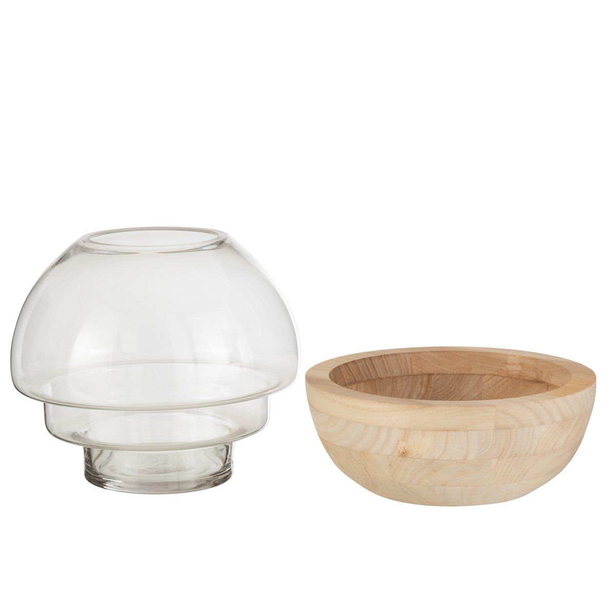 Vase J-Line Round sur une table, décoré avec des fleurs