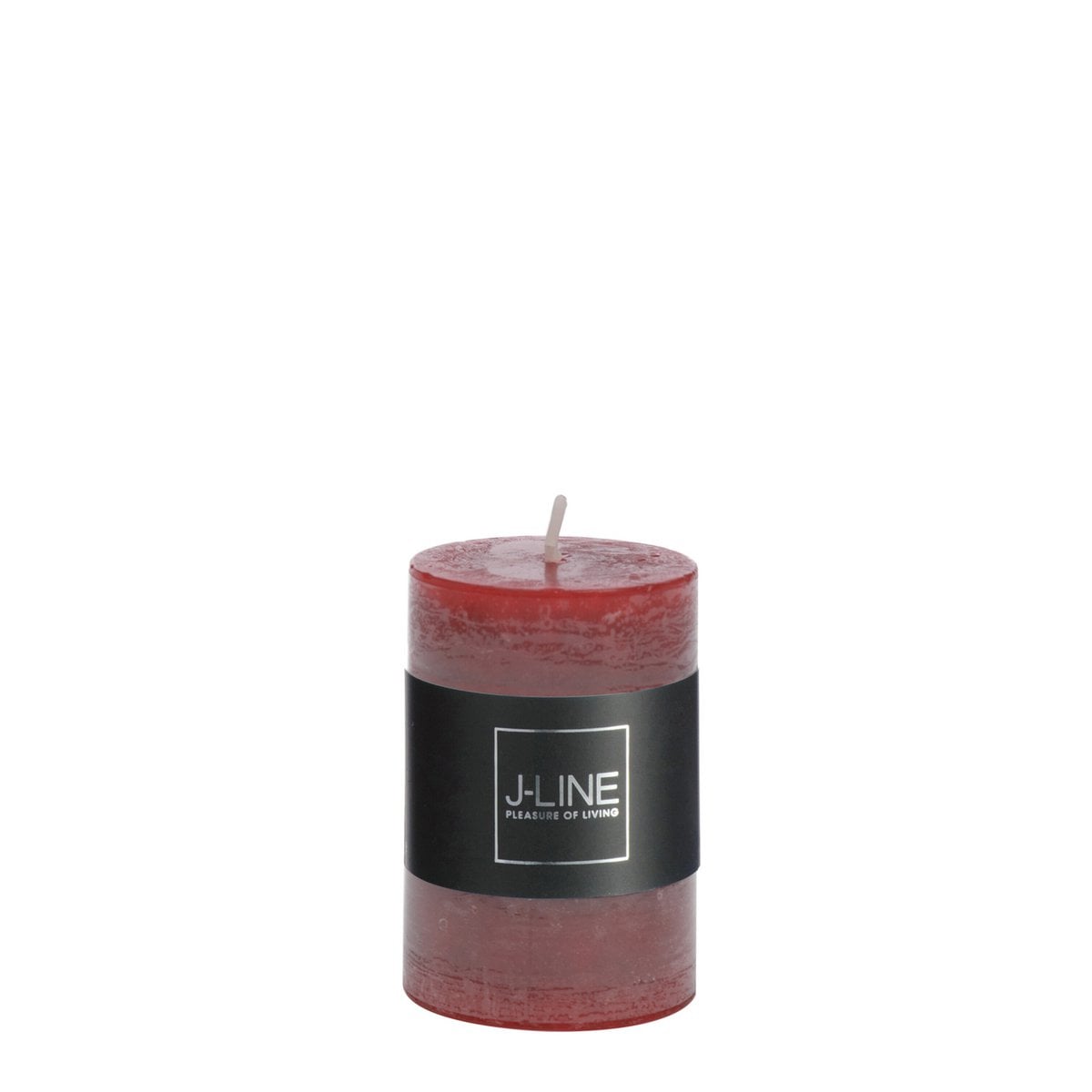 Bougie rouge J-Line sur une table, créant une ambiance chaleureuse.