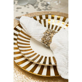 Ensemble de 4 assiettes J-Line Stripe sur une table élégante