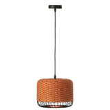 Plafonnier J-Line orange éclairant un salon moderne