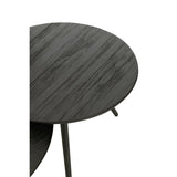 Table J-Line ronde en bois noir dans un salon moderne.