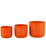 Détail du pot de fleurs J-Line, texture céramique orange