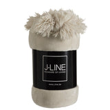 Plaid Pompon J-Line plié, mettant en valeur ses couleurs douces