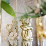 Ornement singe assis en polystone doré
