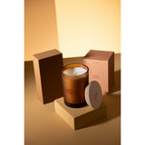 Bougie J-Line Ambre Intime - mise en scène sur une table