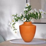 Vase en verre orange foncé