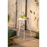 Table d'appoint Seattle Blanc avec décoration florale sur le dessus.