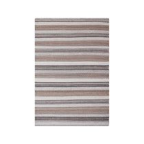 Tapis Morena en jute et laine, vue d'ensemble dans un salon moderne