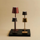Lot de 4 lampes à poser rechargeables dorées Sarphati Mini avec station