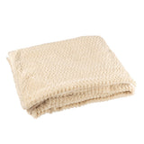 Couverture J-Line beige, vue d'ensemble sur fond neutre.