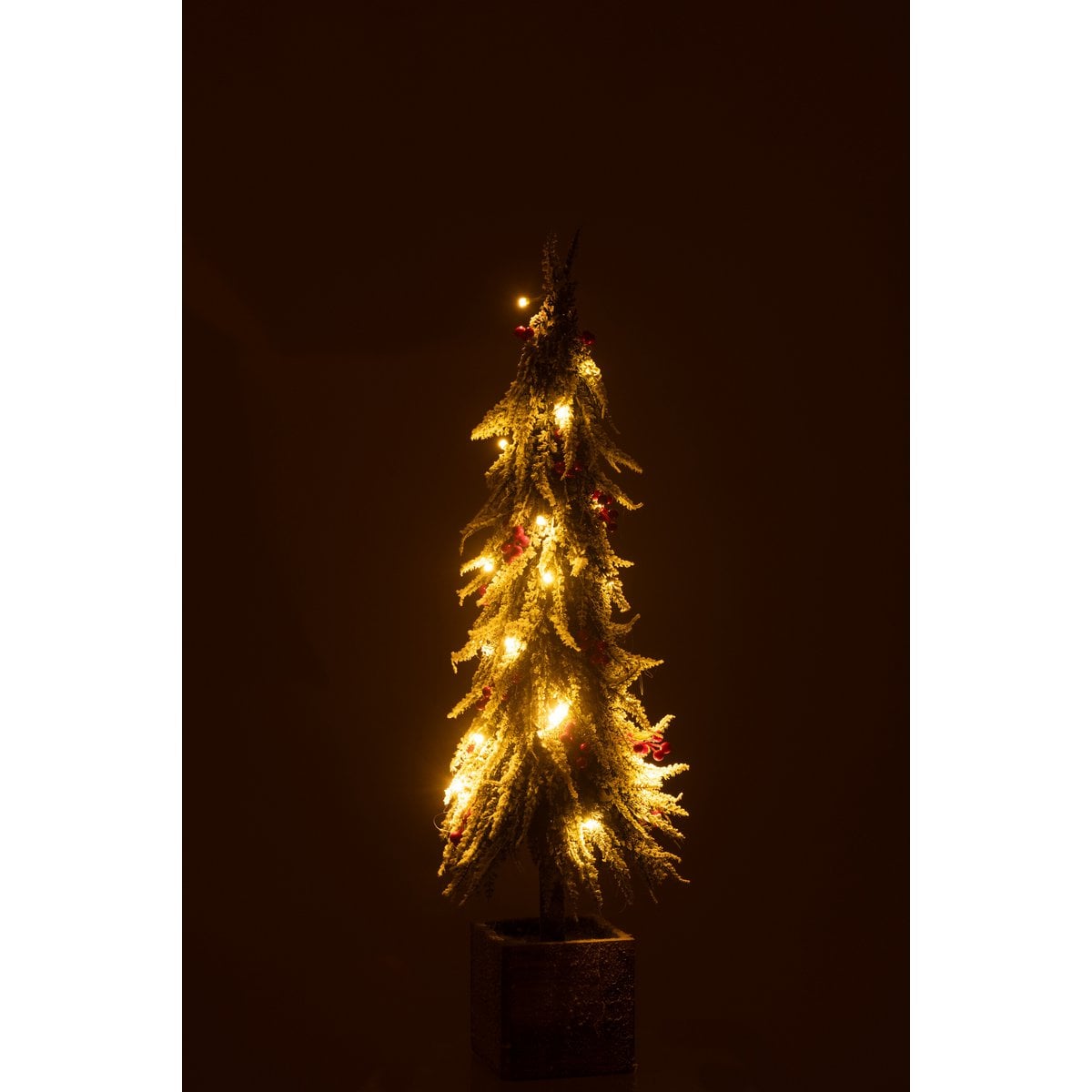 Sapin de Noël J-Line Snow décoré dans un salon élégant
