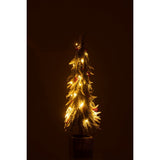 Sapin de Noël J-Line Snow décoré dans un salon élégant