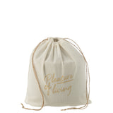 Bougie J-Line Cyra illuminée lors d'un dîner en plein air
