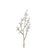 Détail de la branche artificielle J-Line, mettant en valeur ses couleurs crème et or.