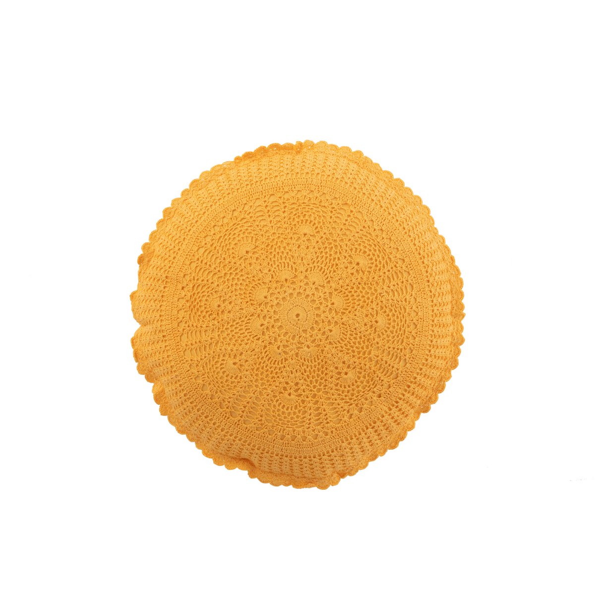 Coussin rond Mia Kant en coton ocre sur un canapé moderne.