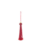 Détail du pendentif J-Line, mettant en valeur la couleur rouge et le matériau en verre.