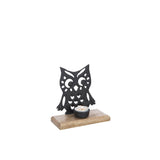 Bougeoir J-Line Hibou sur une table moderne, ambiance chaleureuse