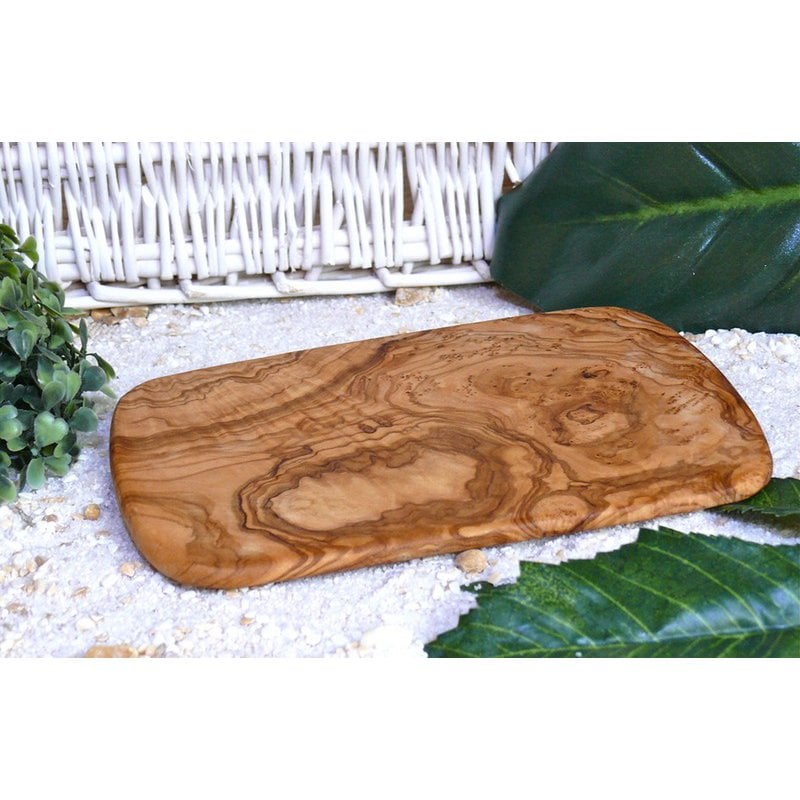 Détail des planches à petit-déjeuner en bois d'olivier avec coins arrondis
