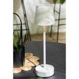 Lampe J-Line Goa sur une table de chevet