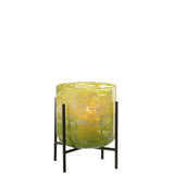 Détail de la lanterne J-Line en marbre vert, mettant en valeur le verre et le métal