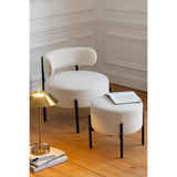 Fauteuil J-Lounge Bouclé sur un tapis élégant