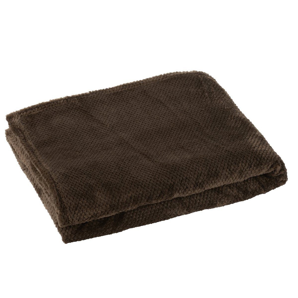 Couverture J-Line Snuggle drapée sur un canapé élégant