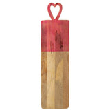 Plateau en bois rose avec des objets décoratifs, mise en scène