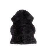Détail du tapis de sol J-Line montrant la texture de la peau de mouton
