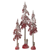 Détail de l'arbre de Noël J-Line avec baies rouges, ambiance festive