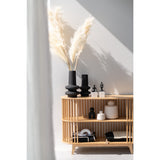 Buffet J-Line Live avec livres et plantes - décor stylé
