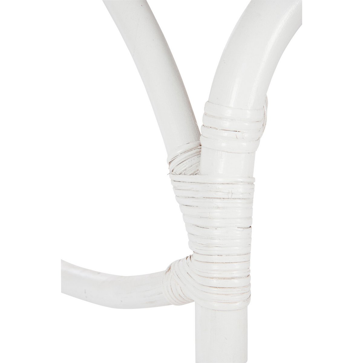 Tabouret à roulettes J-Line en rotin blanc, dans un salon moderne