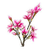 Vue rapprochée des fleurs roses du magnolia artificiel