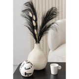 Vase Kira rond sur une table moderne - ambiance chic