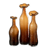 Vase J-Line OpenBrate Lunes sur une table moderne avec décoration