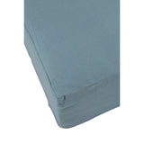 Détail du tissu linon bleu du pouf Monaco
