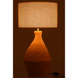 Lampe J-Line Indus jaune éclairant un intérieur moderne
