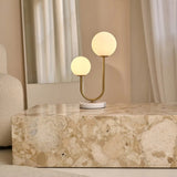 Lampe à poser en marbre blanc et métal doré