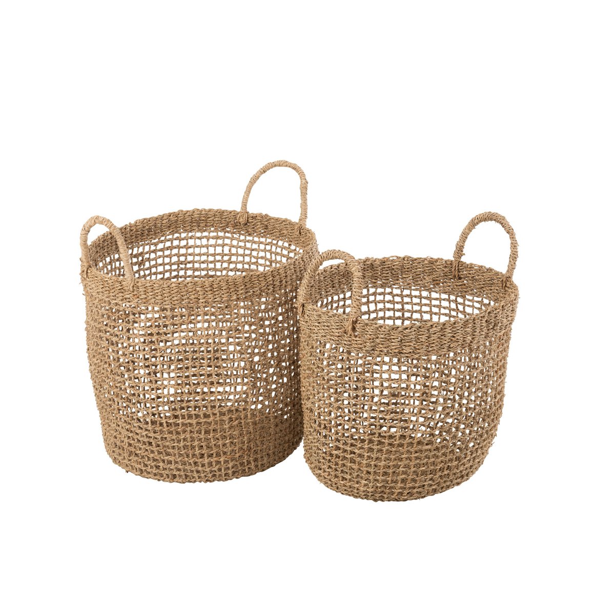 Panier Oasis en seagrass naturel en situation dans un salon bohème
