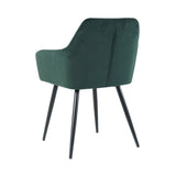 Vue latérale du fauteuil en velours vert avec accoudoirs