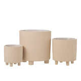 Pot de fleurs J-Line en céramique beige, vue latérale montrant la forme et le style