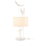 Lampe de table J-Line Birds en polyrésine blanche et beige, vue de face.