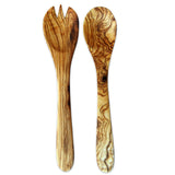 Couverts à salade en bois d'olivier sur une table élégante