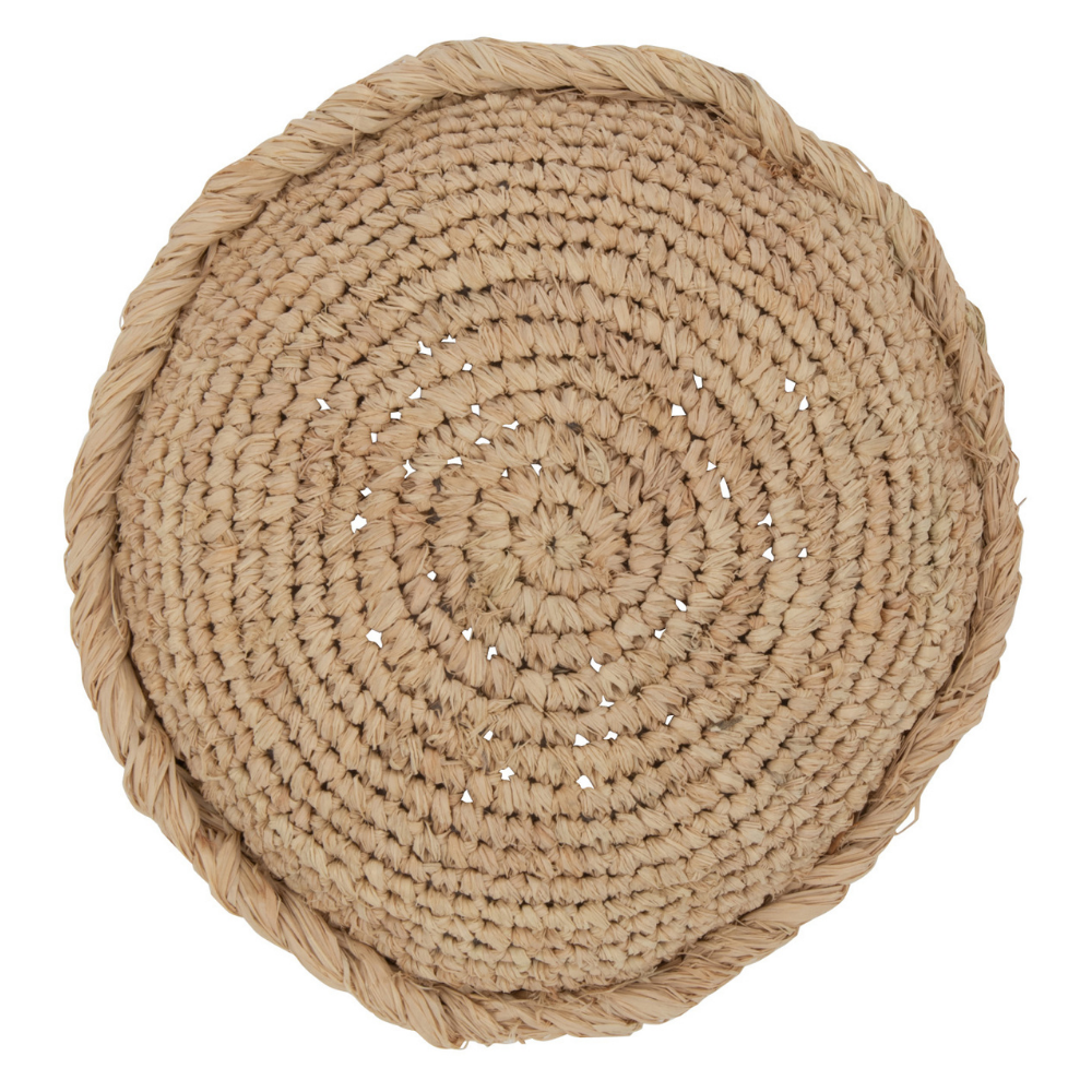 Coussin rond J-Line en osier naturel sur canapé beige